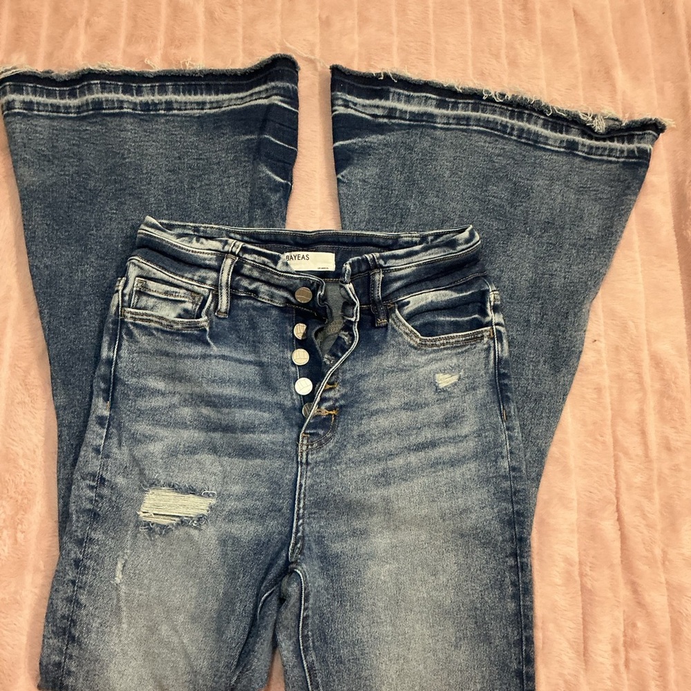 Women's Distressed Blue Jeans